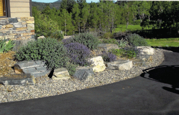 Xeriscape-Planting-with-Mulch-and-Bark-Boulder-and-Gravel-Landscape