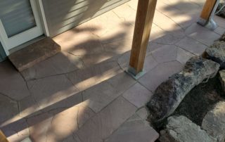 Walk-out basement patio made of flagstone