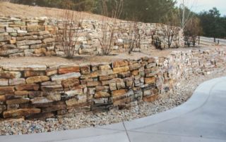 Double-terraced retaining wall with xeriscaping