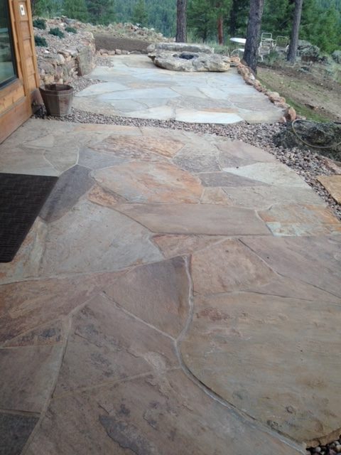 Completed stone patios under deck