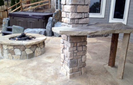 Flagstone bar with fireplace in background